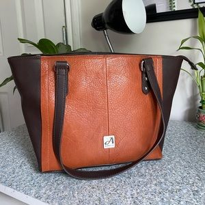 Burnt orange purse.